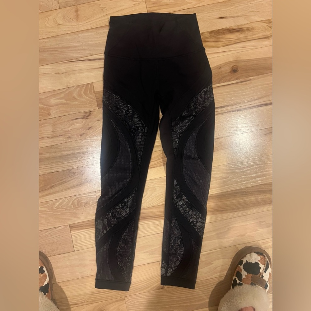 Lululemon black with lace underlay leggings. Size 4!